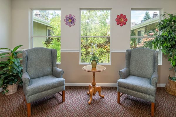 Cozy interior seating area with floral decorations