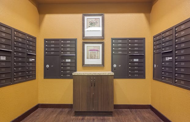 Interior view of mailboxes and decorative art in the hallway