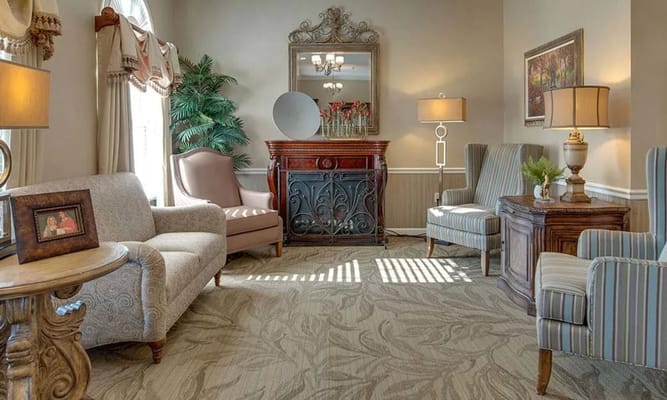 Comfortable living room with seating and decorative furniture