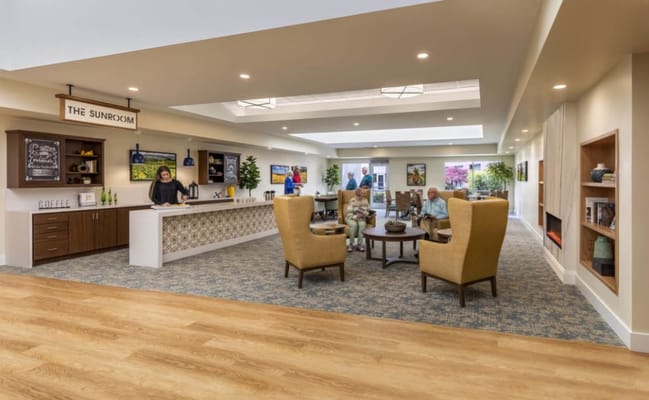 Residents socializing in a bright common area