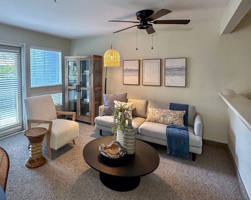 Cozy living area with comfortable furniture and decor