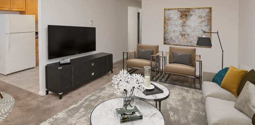 Modern living room featuring comfortable seating and a television