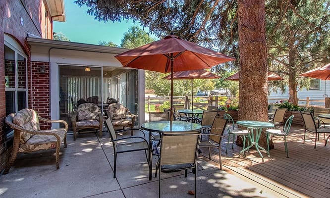 Outdoor seating area with umbrellas and tables