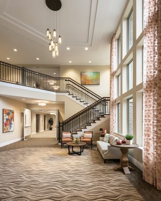 Bright and welcoming common area with a staircase