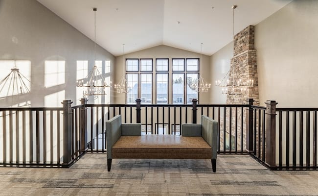 Bright interior space with seating and large windows