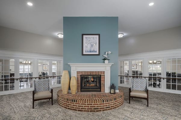 Bright and inviting common area with a fireplace