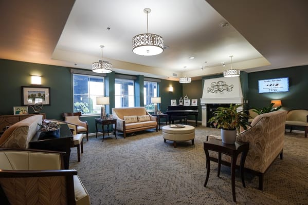 A cozy lounge area with comfortable seating and decor