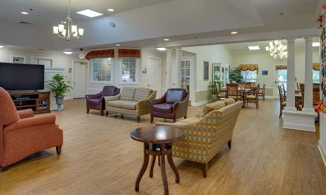 Spacious lobby area with seating and natural light