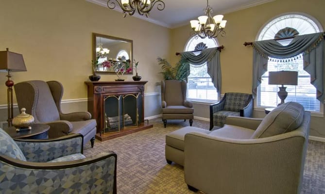 Cozy living room with comfortable seating and a fireplace