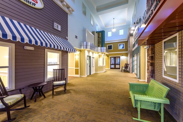 Bright interior hallway with seating and decor