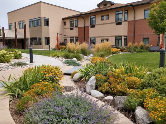 Beautiful garden area surrounding a senior living facility