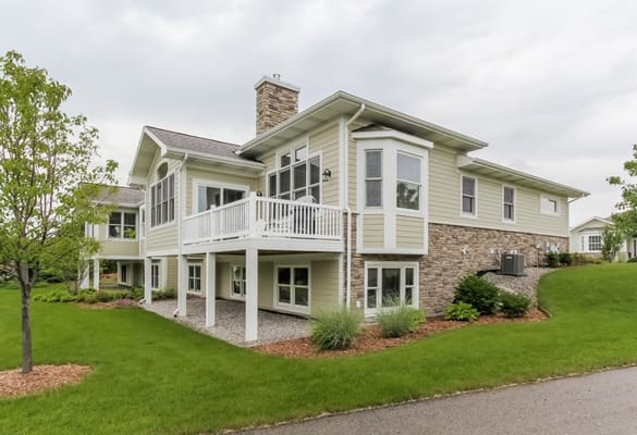 Exterior view of Cook Valley Estates facility with landscaped yard