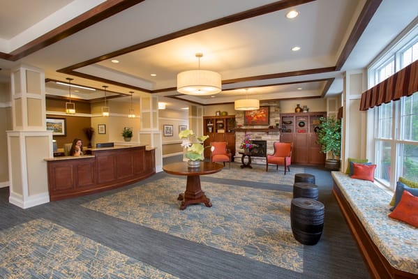 Spacious lobby with reception desk and seating area