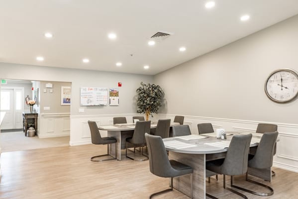Brightly lit dining area with modern tables and chairs