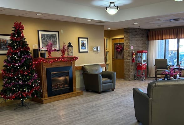 Cozy common area with holiday decorations and seating