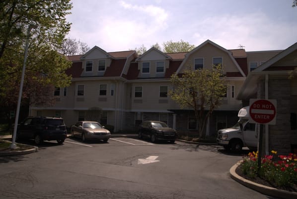 Exterior view of the facility with parking area