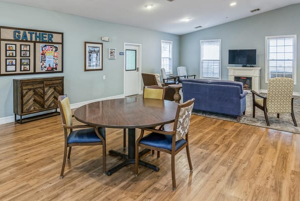 Cozy common area with seating and a dining table