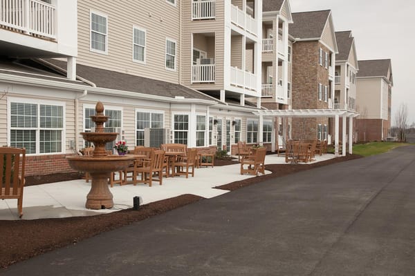 Outdoor seating area with fountain at Danbury Sanctuary Grande