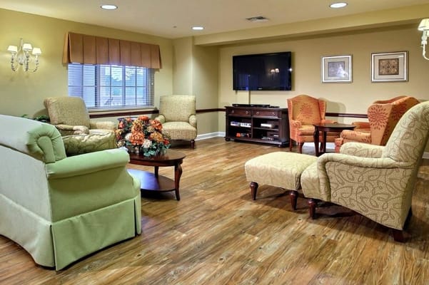 Bright common area with comfortable seating and decor