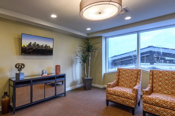 Cozy common area with seating and TV