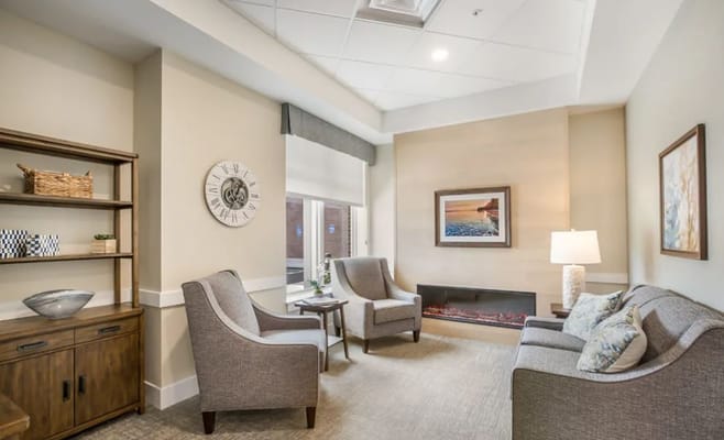 A cozy common area with seating and decor