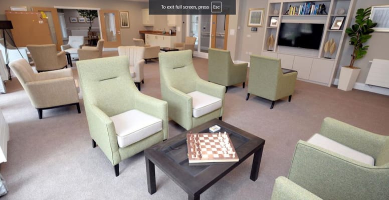 Common area with seating and a chessboard