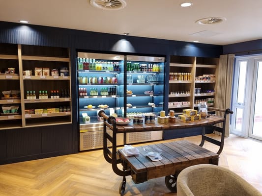 Interior view of a snack area with shelves and refreshments