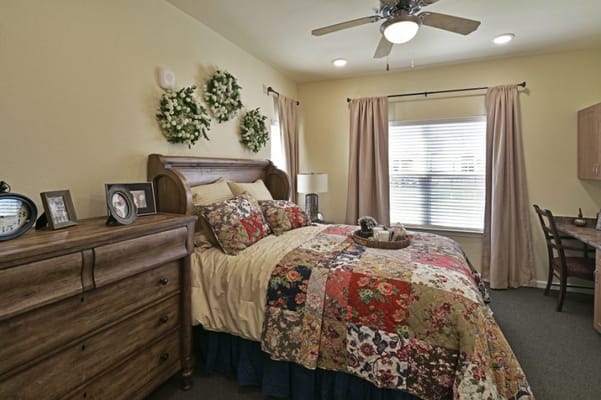 Cozy private resident room with floral bedding