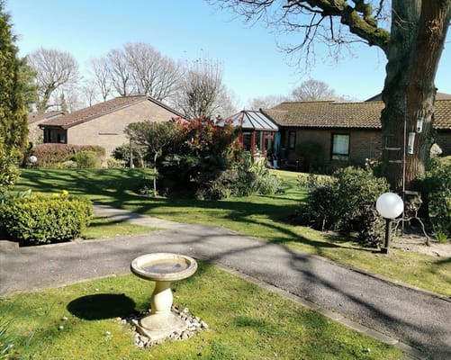 Beautiful garden area with a walkway and seating