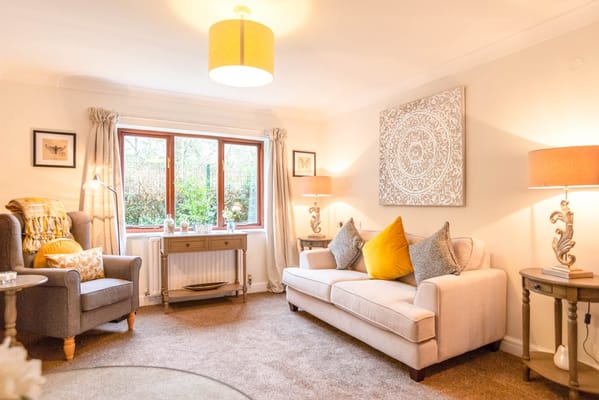 Cozy living room area with comfortable seating and decor