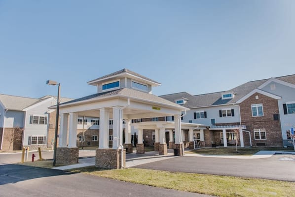 Entrance with a canopy at English Meadows senior living facility