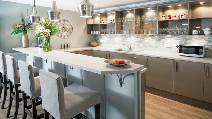 Stylish kitchen bar area with seating and decor