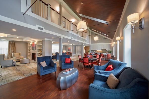 Spacious living room with comfortable seating and dining area