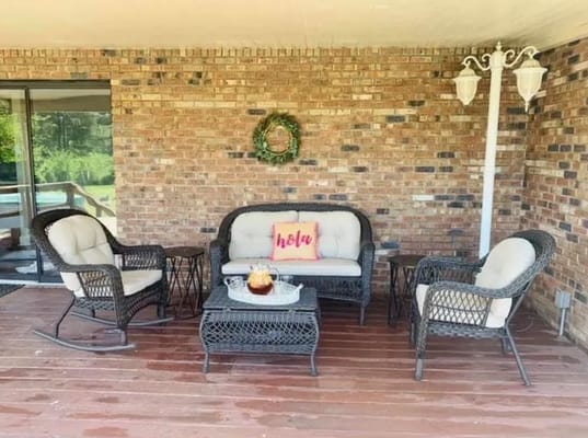 Cozy outdoor seating area with wicker furniture