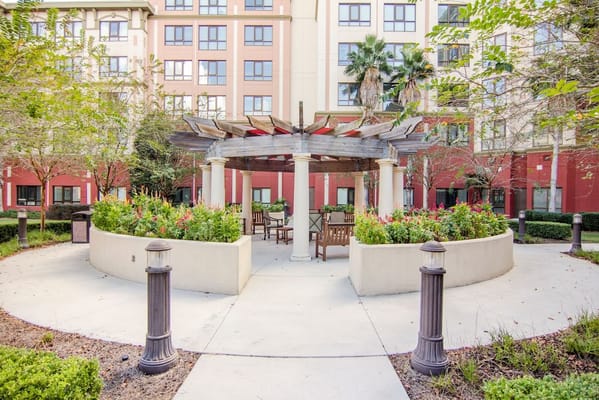 Beautiful outdoor garden seating area with pergola