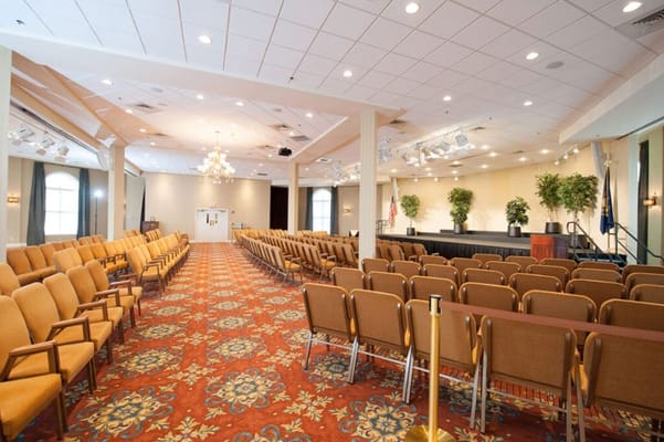 Interior view of a spacious activity room with seating