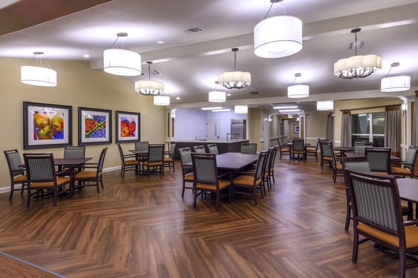 Bright dining room with wooden floors and modern decor