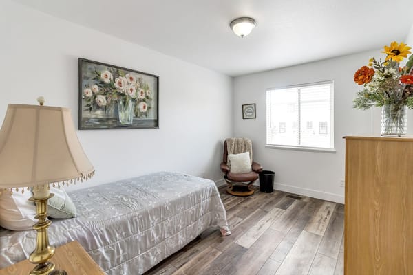 Cozy private resident room with floral decor