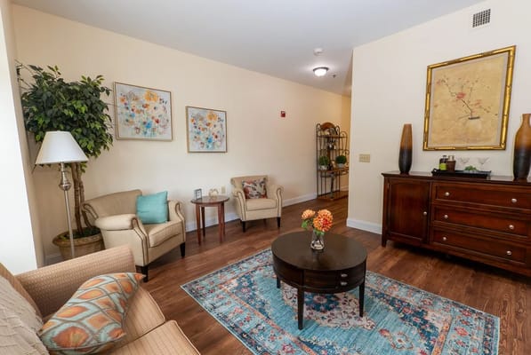 Comfortable common area with seating and artwork