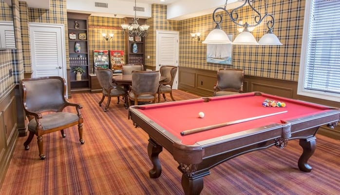 Interior view of a game room with a pool table