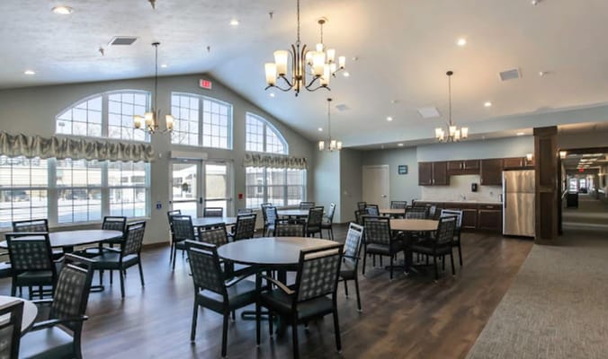 Bright dining area with tables and chairs