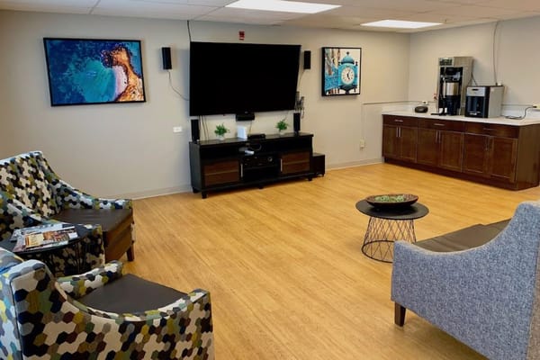 Common area with seating and coffee station