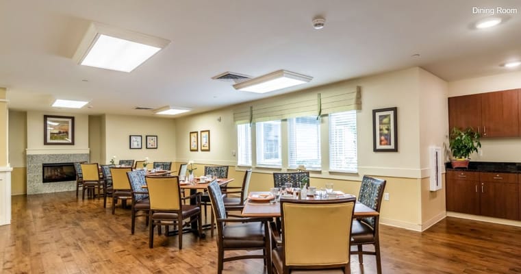 Bright and inviting dining area with tables set for meals.