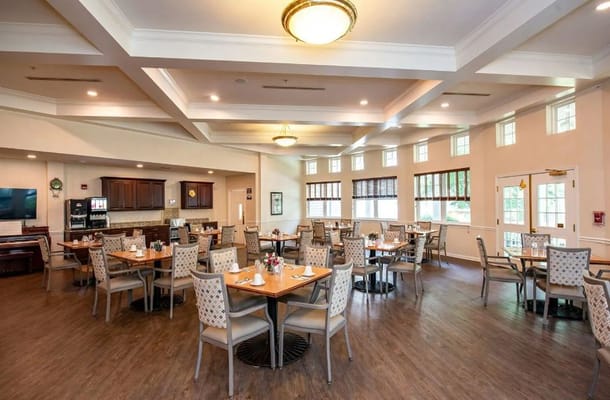 Elegant dining area with tables set for meals