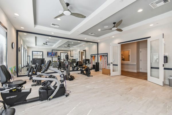 Interior view of a fitness area with exercise equipment