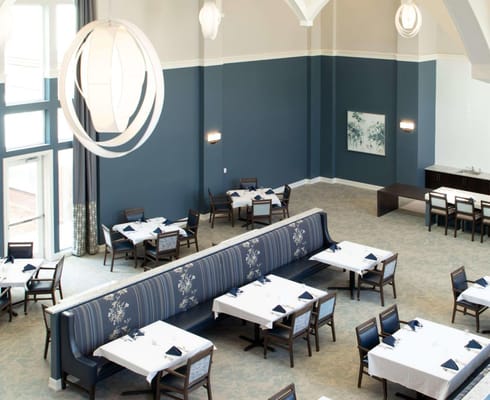 Interior dining room with tables and lighting