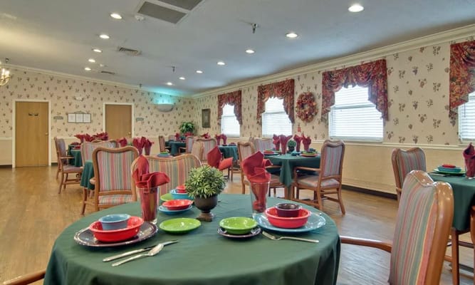 Elegant dining setup with colorful table settings in the dining room.