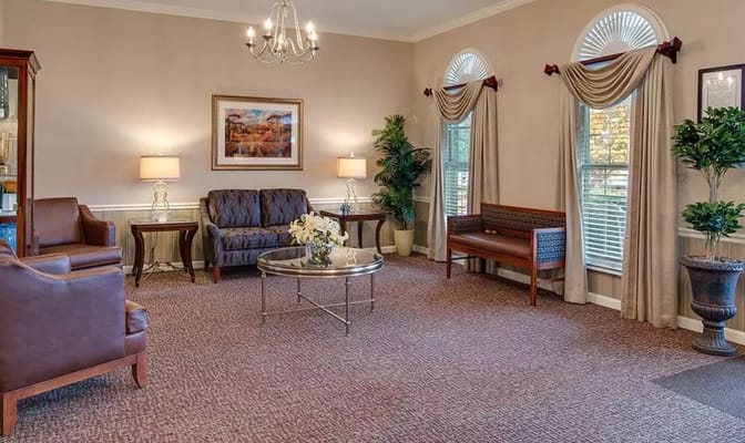 Cozy living room with seating and plants