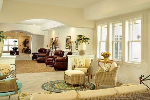 Bright and welcoming common area with seating and decor