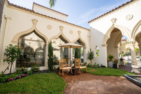 Outdoor seating area with landscaped garden